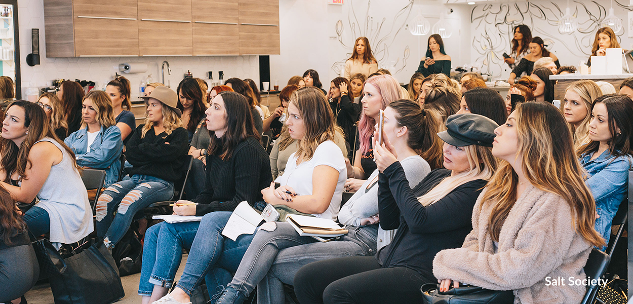 Hair stylists in training sessions